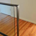 Broadview Remodel - Detail of custom blackened steel and glass guardrail